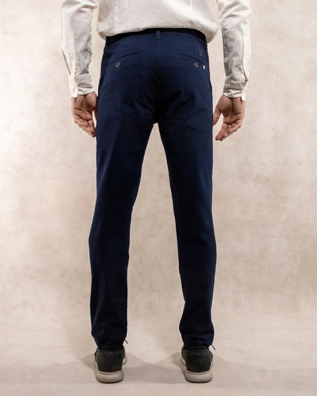 Back view of men's navy blue stretch chino pants by DANTE