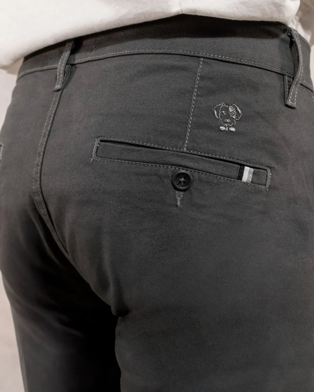 Close-up photo of men's grey -colored stretch chino pants by DANTE.