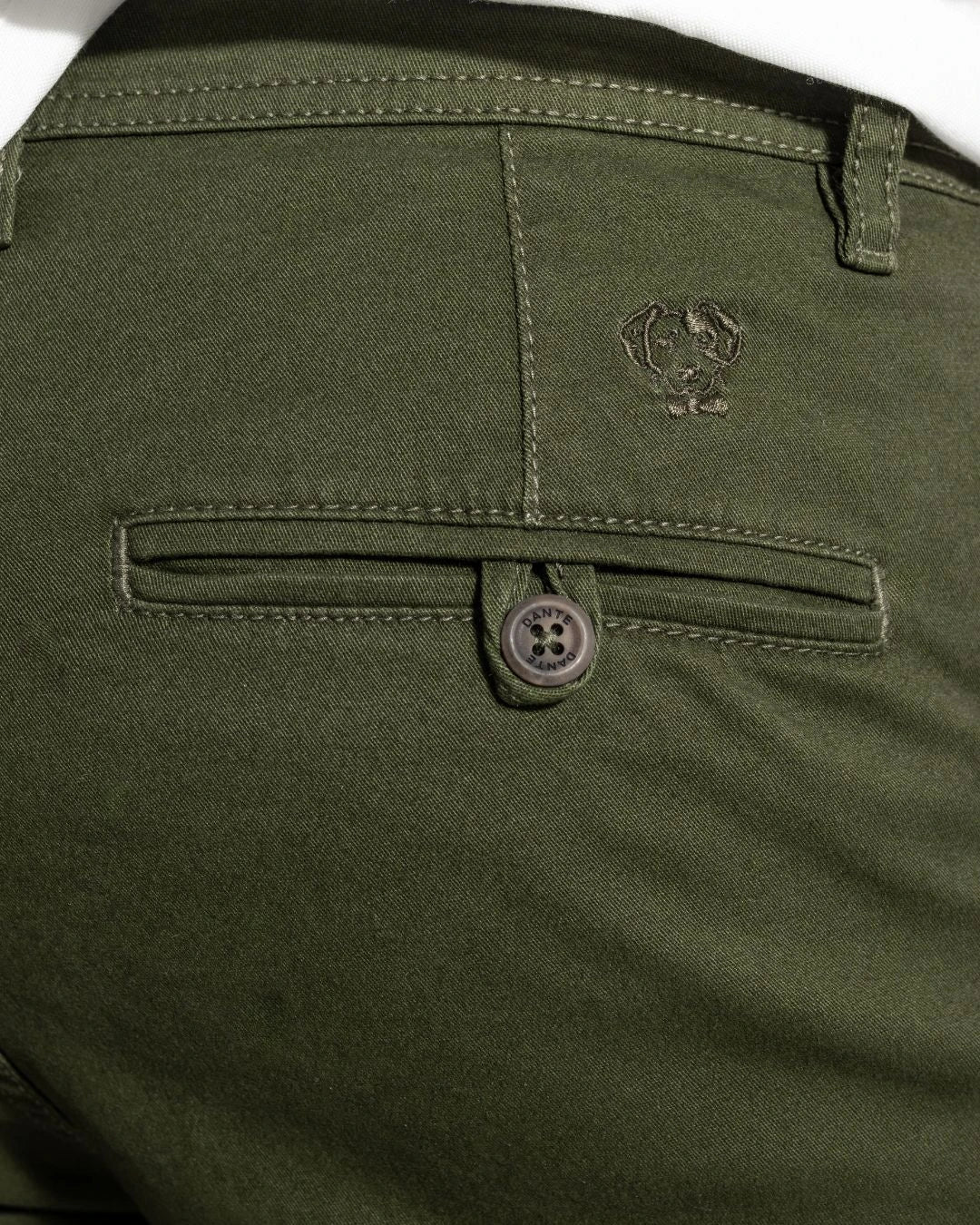 Close-up photo of men's military green -colored stretch chino pants by DANTE.