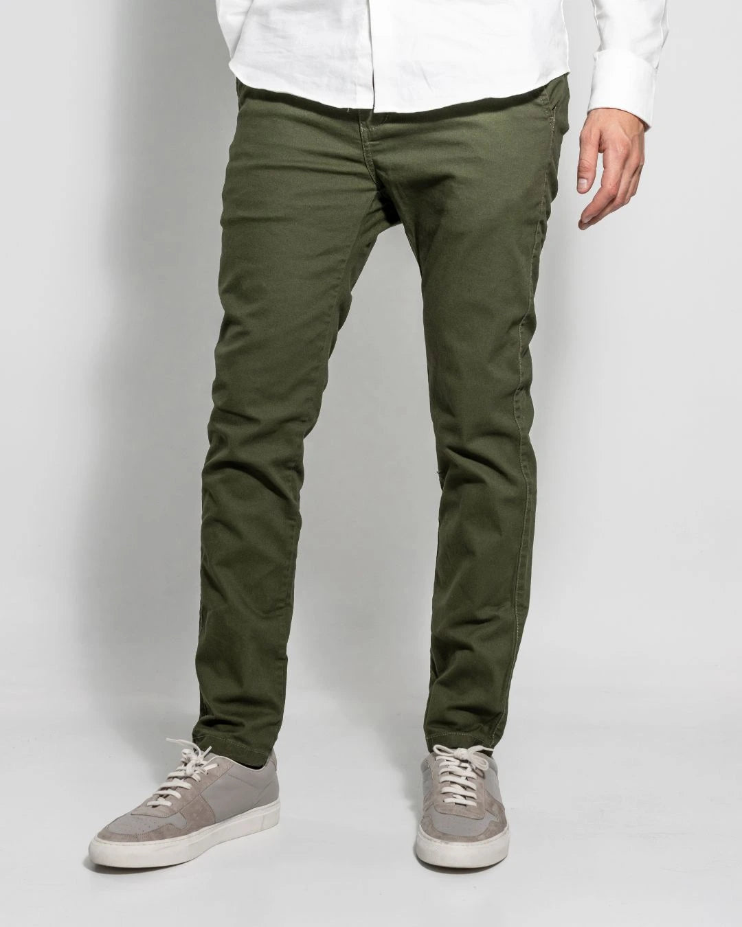 Model photo of men's military green stretch chino pants by DANTE.