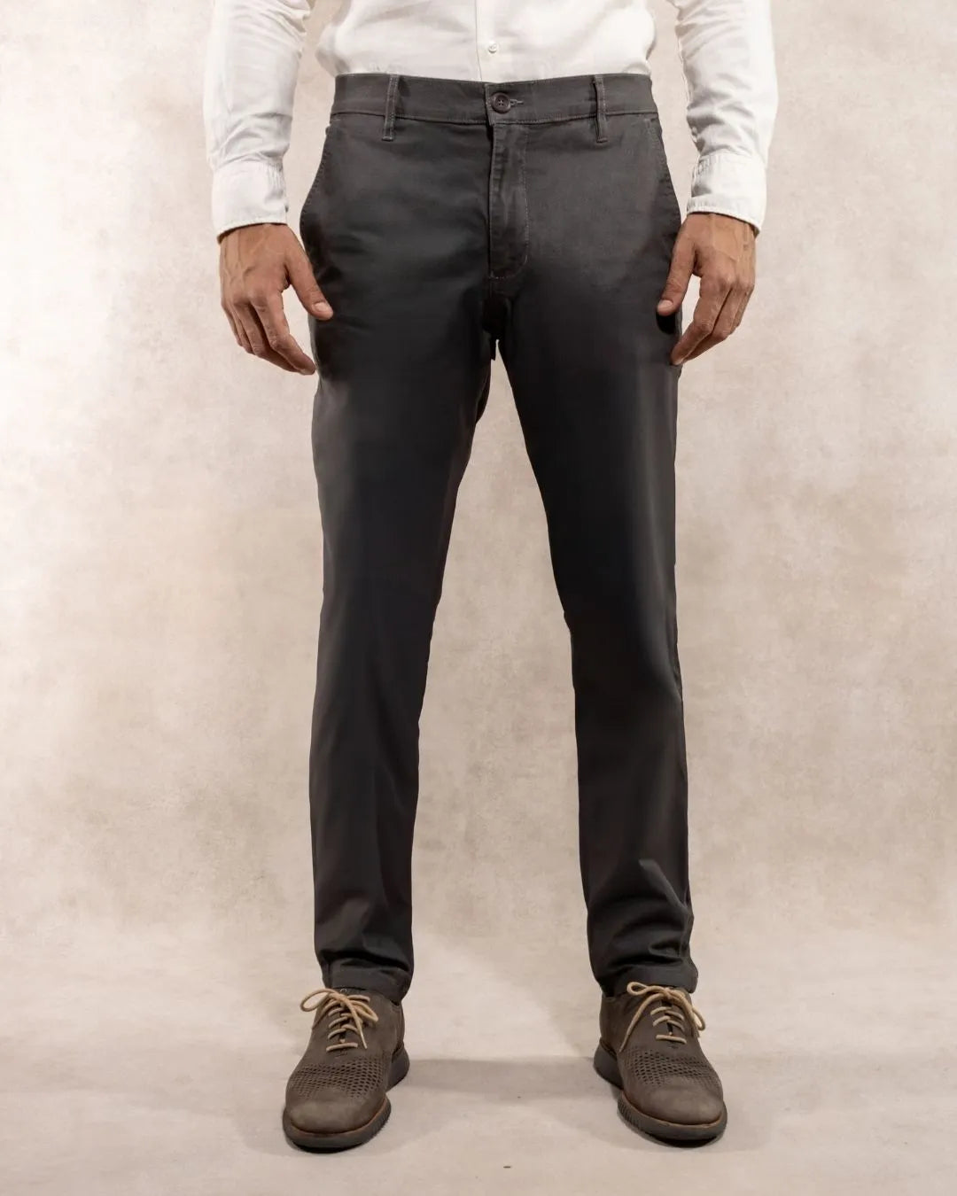 Model photo of men's grey stretch chino pants by DANTE.