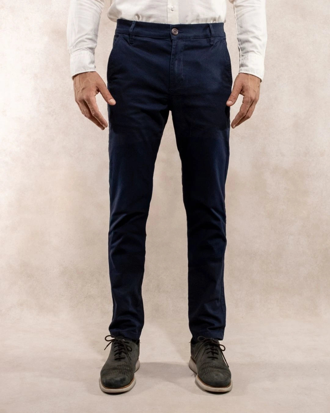 Model photo of men's navy blue stretch chino pants by DANTE.